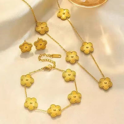 Cartine® Cleef Halskette + Ohrringe